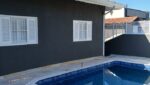 casa-térrea-3-dorm-aruã-venda-ar-condicionado-lareira-piscina-churrasq (3)
